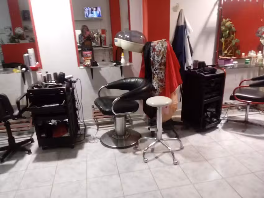 PELUQUERIA UNISEX STATUS