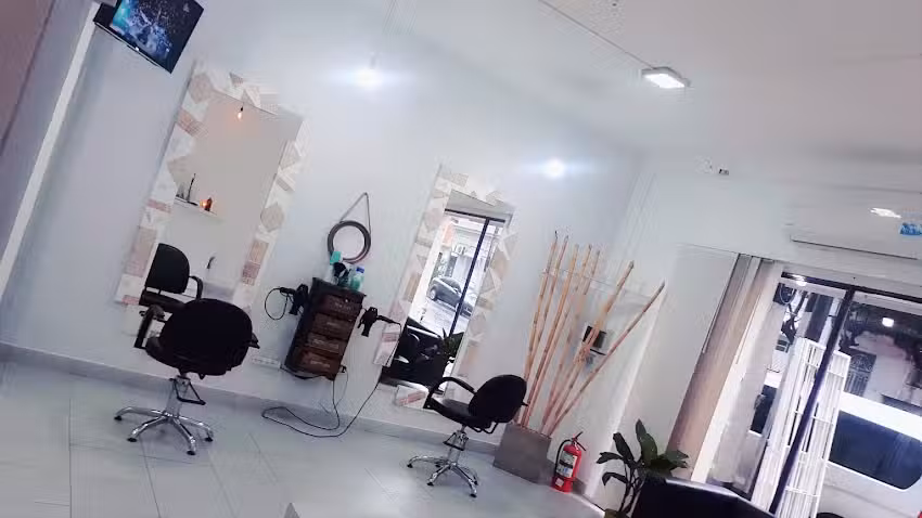 Purpura Peluqueria Unisex